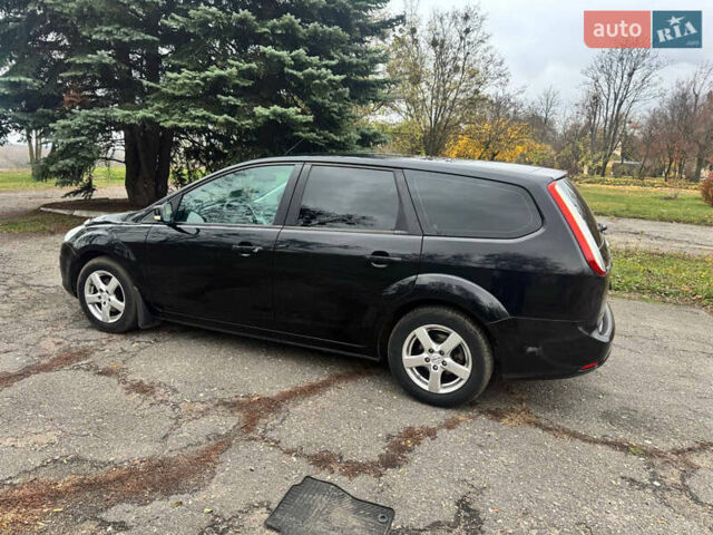 Черный Форд Фокус, объемом двигателя 1.8 л и пробегом 160 тыс. км за 5700 $, фото 7 на Automoto.ua