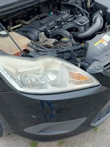 Черный Форд Фокус, объемом двигателя 1.6 л и пробегом 290 тыс. км за 5100 $, фото 7 на Automoto.ua