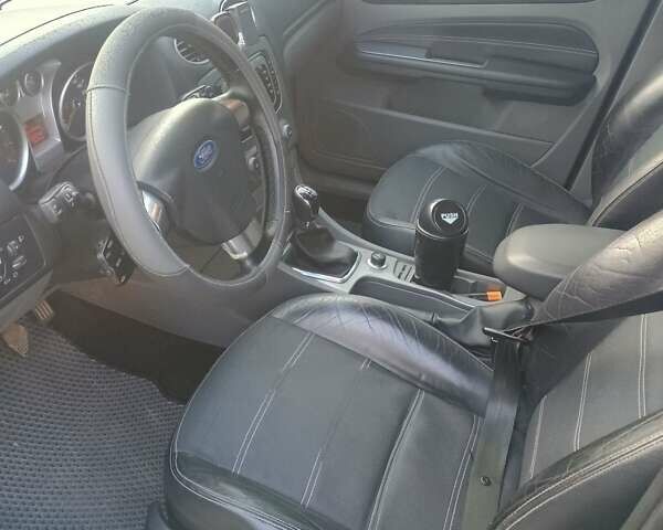 Форд Фокус 2008 у Тернополі на Automoto.ua Чорний Форд Фокус, об'ємом двигуна 2 л та пробігом 233 тис. км за 6300 $, фото 13 на Automoto.ua