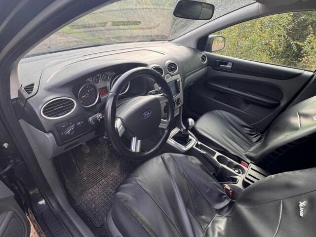 Черный Форд Фокус, объемом двигателя 1.6 л и пробегом 280 тыс. км за 4800 $, фото 6 на Automoto.ua