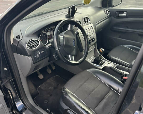 Черный Форд Фокус, объемом двигателя 1.6 л и пробегом 247 тыс. км за 4500 $, фото 4 на Automoto.ua