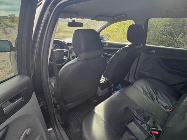 Черный Форд Фокус, объемом двигателя 1.6 л и пробегом 280 тыс. км за 4800 $, фото 5 на Automoto.ua