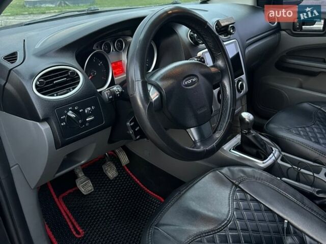 Чорний Форд Фокус, об'ємом двигуна 1.6 л та пробігом 295 тис. км за 5599 $, фото 15 на Automoto.ua