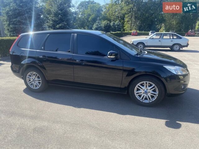 Чорний Форд Фокус, об'ємом двигуна 2 л та пробігом 220 тис. км за 6750 $, фото 4 на Automoto.ua