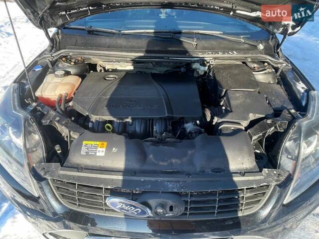 Черный Форд Фокус, объемом двигателя 1.8 л и пробегом 216 тыс. км за 5550 $, фото 11 на Automoto.ua