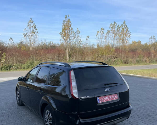 Черный Форд Фокус, объемом двигателя 1.6 л и пробегом 210 тыс. км за 4800 $, фото 2 на Automoto.ua