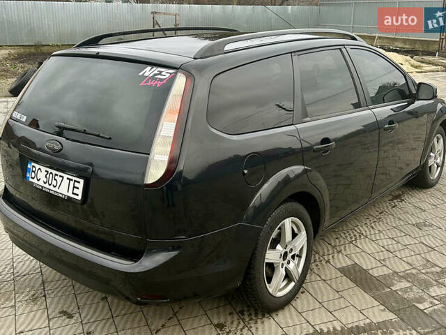 Чорний Форд Фокус, об'ємом двигуна 1.6 л та пробігом 318 тис. км за 4799 $, фото 5 на Automoto.ua
