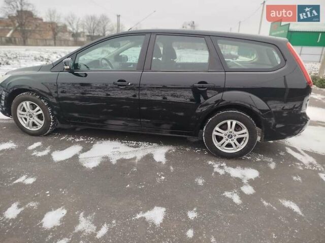 Чорний Форд Фокус, об'ємом двигуна 1.8 л та пробігом 192 тис. км за 5900 $, фото 4 на Automoto.ua