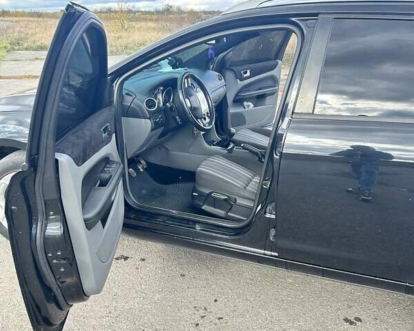 Черный Форд Фокус, объемом двигателя 1.6 л и пробегом 355 тыс. км за 4600 $, фото 9 на Automoto.ua