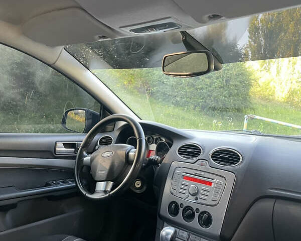 Черный Форд Фокус, объемом двигателя 2 л и пробегом 366 тыс. км за 6999 $, фото 8 на Automoto.ua