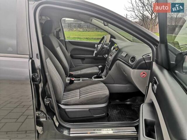 Черный Форд Фокус, объемом двигателя 1.8 л и пробегом 300 тыс. км за 5900 $, фото 10 на Automoto.ua