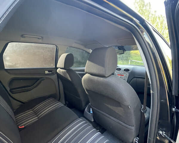 Черный Форд Фокус, объемом двигателя 2 л и пробегом 366 тыс. км за 6999 $, фото 6 на Automoto.ua