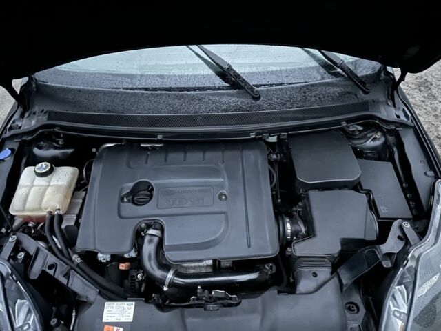 Черный Форд Фокус, объемом двигателя 1.6 л и пробегом 235 тыс. км за 5350 $, фото 7 на Automoto.ua