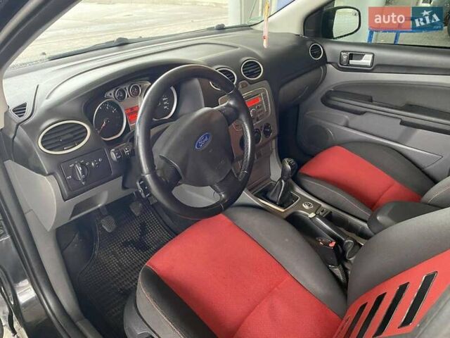 Черный Форд Фокус, объемом двигателя 1.6 л и пробегом 257 тыс. км за 6400 $, фото 16 на Automoto.ua