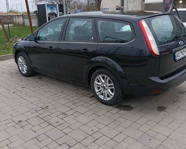 Форд Фокус 2009 у Ужгороді на Automoto.ua Чорний Форд Фокус, об'ємом двигуна 1.6 л та пробігом 210 тис. км за 5800 $, фото 16 на Automoto.ua
