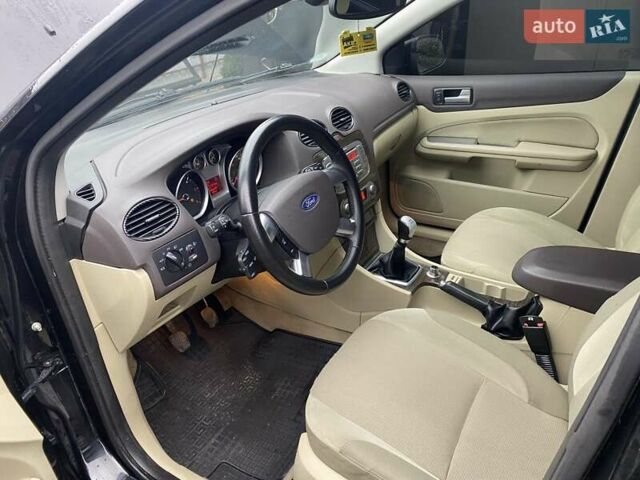 Черный Форд Фокус, объемом двигателя 1.56 л и пробегом 242 тыс. км за 5500 $, фото 18 на Automoto.ua