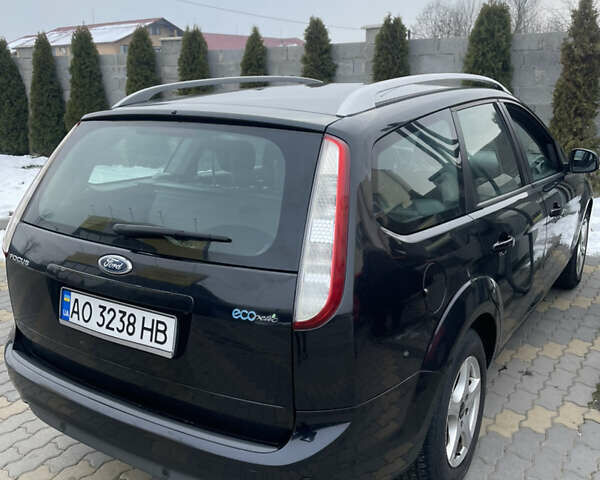 Черный Форд Фокус, объемом двигателя 1.56 л и пробегом 270 тыс. км за 5400 $, фото 5 на Automoto.ua