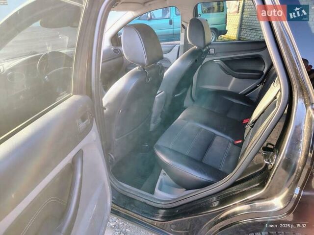 Чорний Форд Фокус, об'ємом двигуна 1.56 л та пробігом 308 тис. км за 6500 $, фото 18 на Automoto.ua