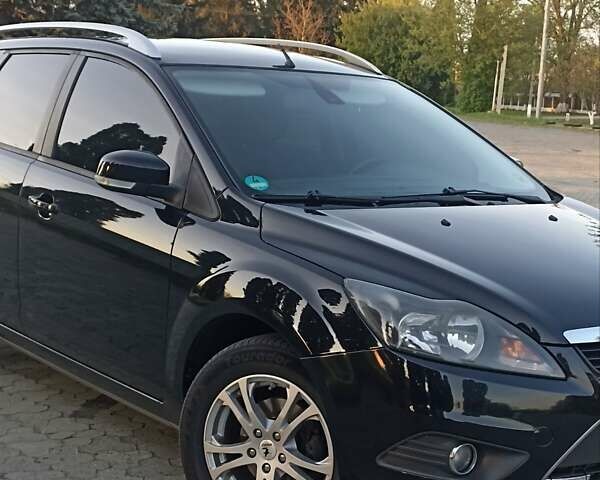Черный Форд Фокус, объемом двигателя 1.6 л и пробегом 247 тыс. км за 5900 $, фото 3 на Automoto.ua