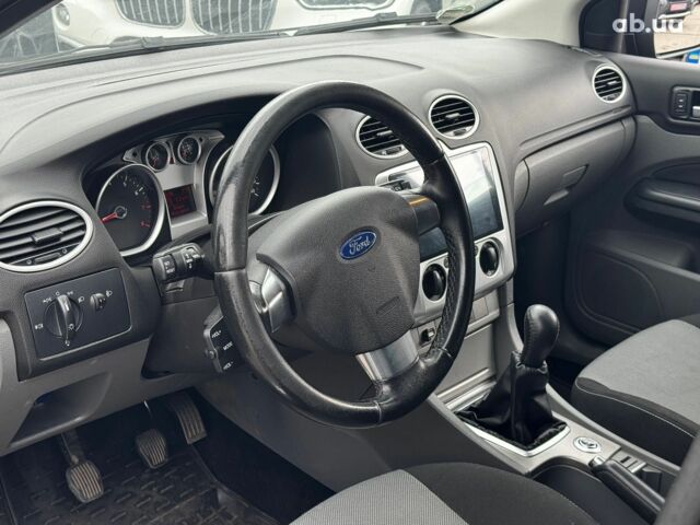 Черный Форд Фокус, объемом двигателя 1.6 л и пробегом 257 тыс. км за 5690 $, фото 10 на Automoto.ua