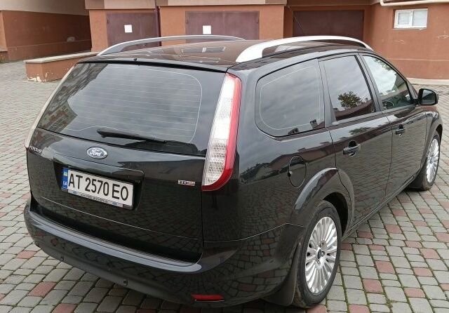 Черный Форд Фокус, объемом двигателя 1.6 л и пробегом 208 тыс. км за 6565 $, фото 6 на Automoto.ua