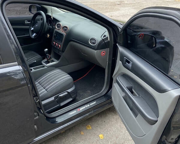 Черный Форд Фокус, объемом двигателя 1.6 л и пробегом 292 тыс. км за 5100 $, фото 8 на Automoto.ua