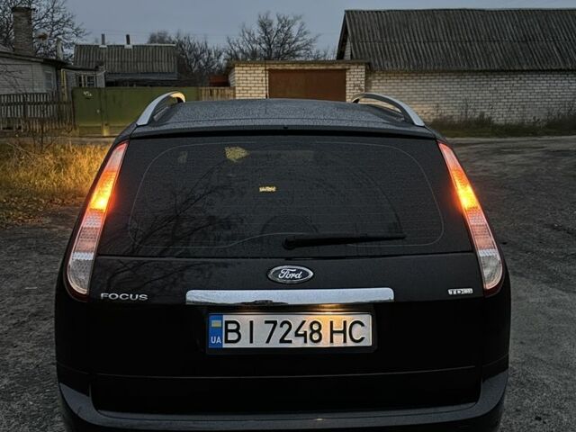 Черный Форд Фокус, объемом двигателя 1.6 л и пробегом 235 тыс. км за 5350 $, фото 3 на Automoto.ua