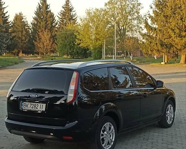 Черный Форд Фокус, объемом двигателя 1.6 л и пробегом 247 тыс. км за 5900 $, фото 8 на Automoto.ua