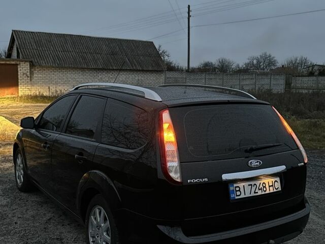 Черный Форд Фокус, объемом двигателя 1.6 л и пробегом 235 тыс. км за 5350 $, фото 2 на Automoto.ua