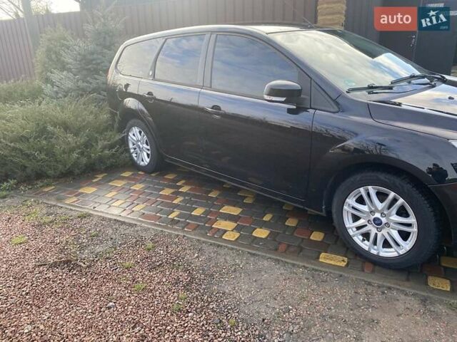 Черный Форд Фокус, объемом двигателя 1.56 л и пробегом 242 тыс. км за 5500 $, фото 6 на Automoto.ua