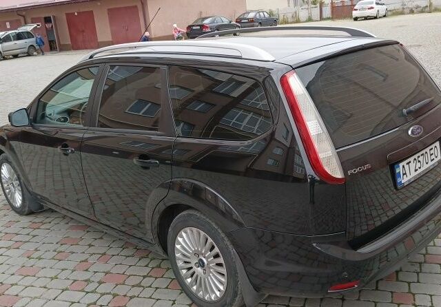 Черный Форд Фокус, объемом двигателя 1.6 л и пробегом 208 тыс. км за 6565 $, фото 7 на Automoto.ua