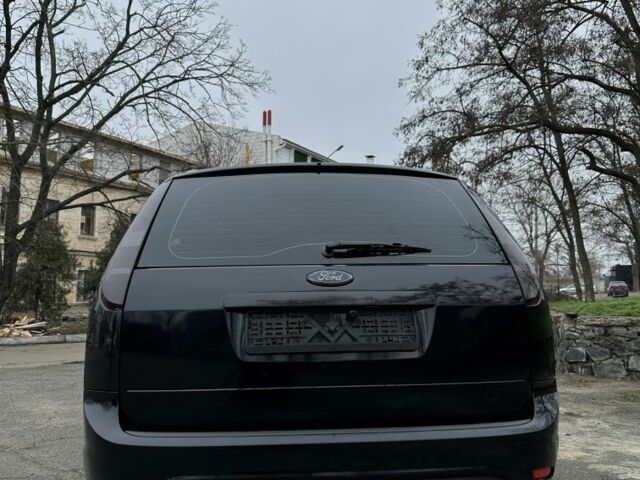 Черный Форд Фокус, объемом двигателя 1.8 л и пробегом 267 тыс. км за 5600 $, фото 4 на Automoto.ua