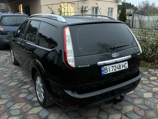 Черный Форд Фокус, объемом двигателя 1.6 л и пробегом 235 тыс. км за 5350 $, фото 1 на Automoto.ua