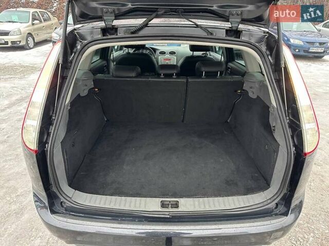 Черный Форд Фокус, объемом двигателя 1.6 л и пробегом 167 тыс. км за 5750 $, фото 7 на Automoto.ua