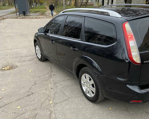 Черный Форд Фокус, объемом двигателя 1.6 л и пробегом 292 тыс. км за 5100 $, фото 4 на Automoto.ua