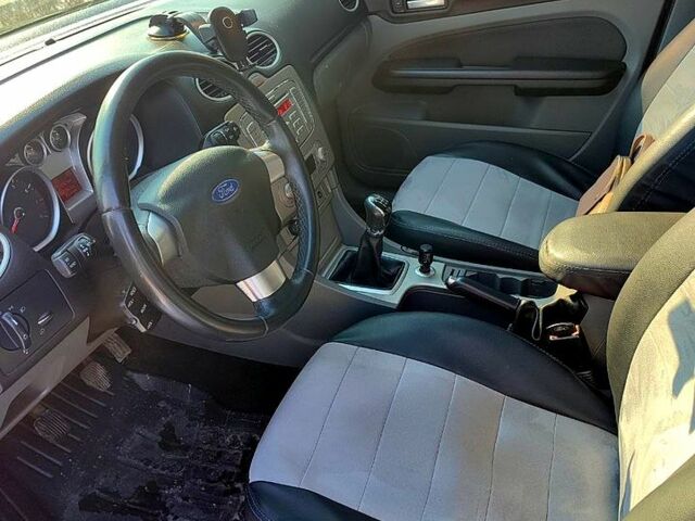 Черный Форд Фокус, объемом двигателя 1.6 л и пробегом 209 тыс. км за 5950 $, фото 7 на Automoto.ua