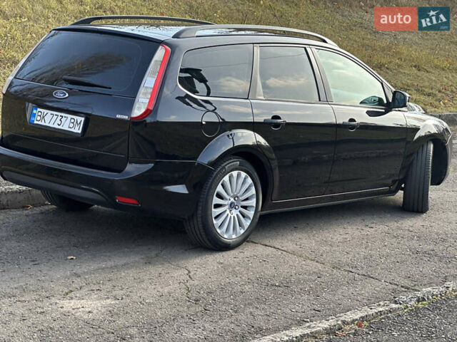 Черный Форд Фокус, объемом двигателя 1.56 л и пробегом 240 тыс. км за 6350 $, фото 7 на Automoto.ua