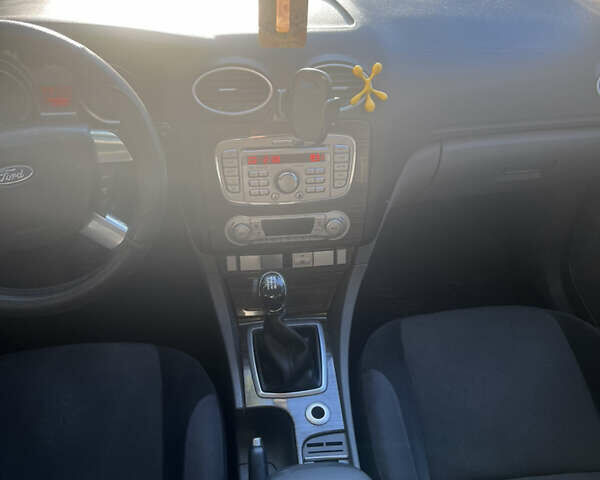 Форд Фокус 2009 у Ужгороді на Automoto.ua Чорний Форд Фокус, об'ємом двигуна 1.6 л та пробігом 210 тис. км за 5800 $, фото 8 на Automoto.ua