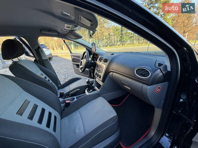 Чорний Форд Фокус, об'ємом двигуна 1.6 л та пробігом 278 тис. км за 5599 $, фото 31 на Automoto.ua