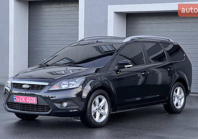 Черный Форд Фокус, объемом двигателя 1.8 л и пробегом 218 тыс. км за 5799 $, фото 11 на Automoto.ua