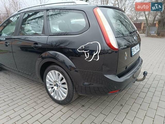 Черный Форд Фокус, объемом двигателя 1.8 л и пробегом 286 тыс. км за 5850 $, фото 4 на Automoto.ua