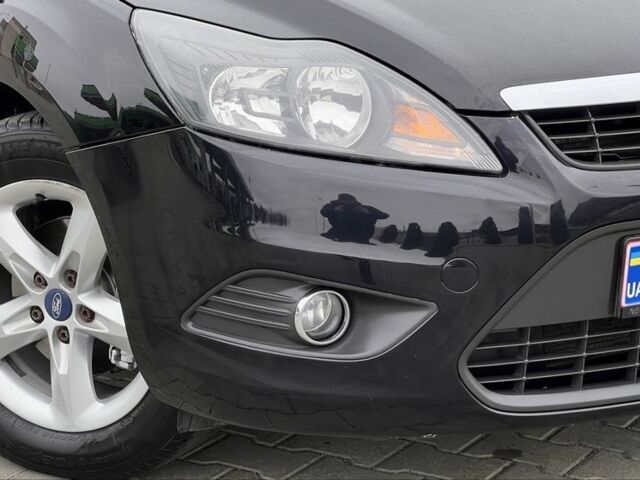 Черный Форд Фокус, объемом двигателя 1.8 л и пробегом 218 тыс. км за 5800 $, фото 15 на Automoto.ua