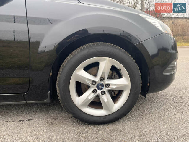 Чорний Форд Фокус, об'ємом двигуна 1.6 л та пробігом 193 тис. км за 6199 $, фото 11 на Automoto.ua