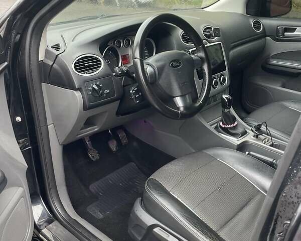 Черный Форд Фокус, объемом двигателя 1.6 л и пробегом 307 тыс. км за 5300 $, фото 11 на Automoto.ua