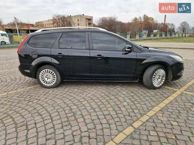 Черный Форд Фокус, объемом двигателя 1.56 л и пробегом 230 тыс. км за 5800 $, фото 4 на Automoto.ua