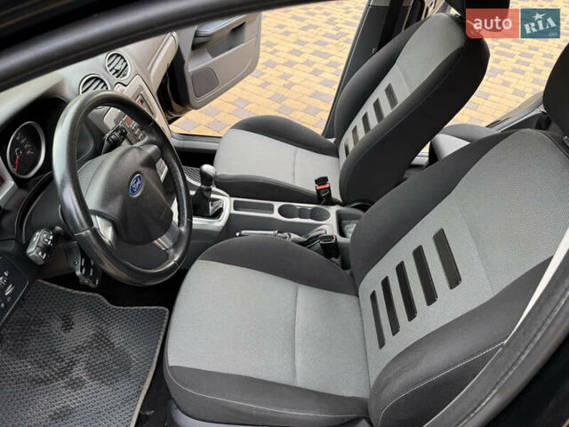 Черный Форд Фокус, объемом двигателя 1.6 л и пробегом 216 тыс. км за 5650 $, фото 11 на Automoto.ua