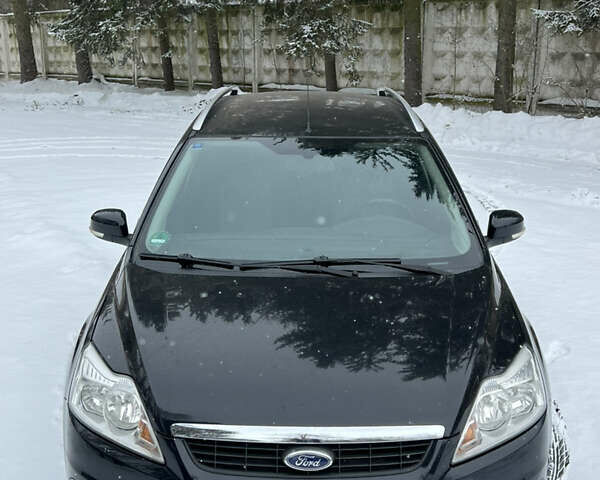 Черный Форд Фокус, объемом двигателя 1.8 л и пробегом 265 тыс. км за 5700 $, фото 2 на Automoto.ua