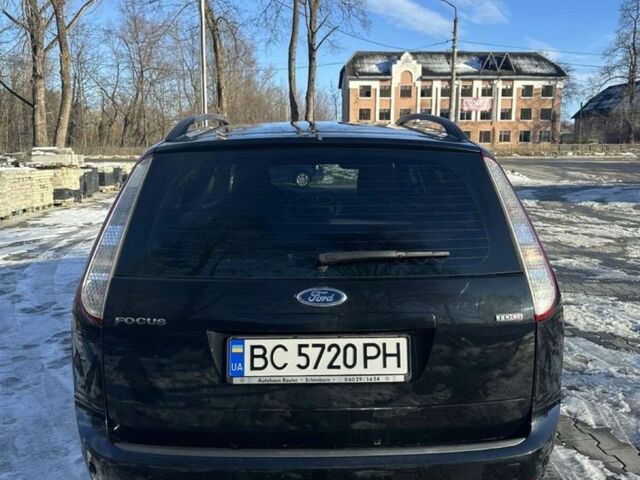 Черный Форд Фокус, объемом двигателя 1.6 л и пробегом 280 тыс. км за 5750 $, фото 2 на Automoto.ua
