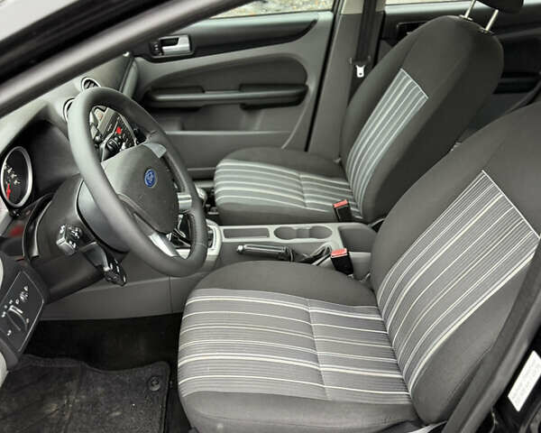 Черный Форд Фокус, объемом двигателя 1.6 л и пробегом 195 тыс. км за 5700 $, фото 104 на Automoto.ua