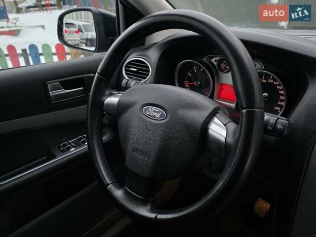 Черный Форд Фокус, объемом двигателя 1.6 л и пробегом 203 тыс. км за 5950 $, фото 36 на Automoto.ua